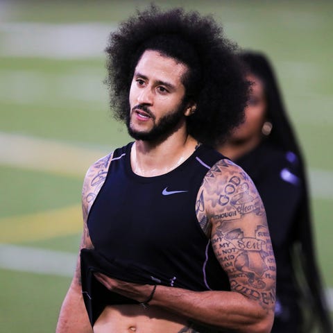 Colin Kaepernick looks on during the workout held 