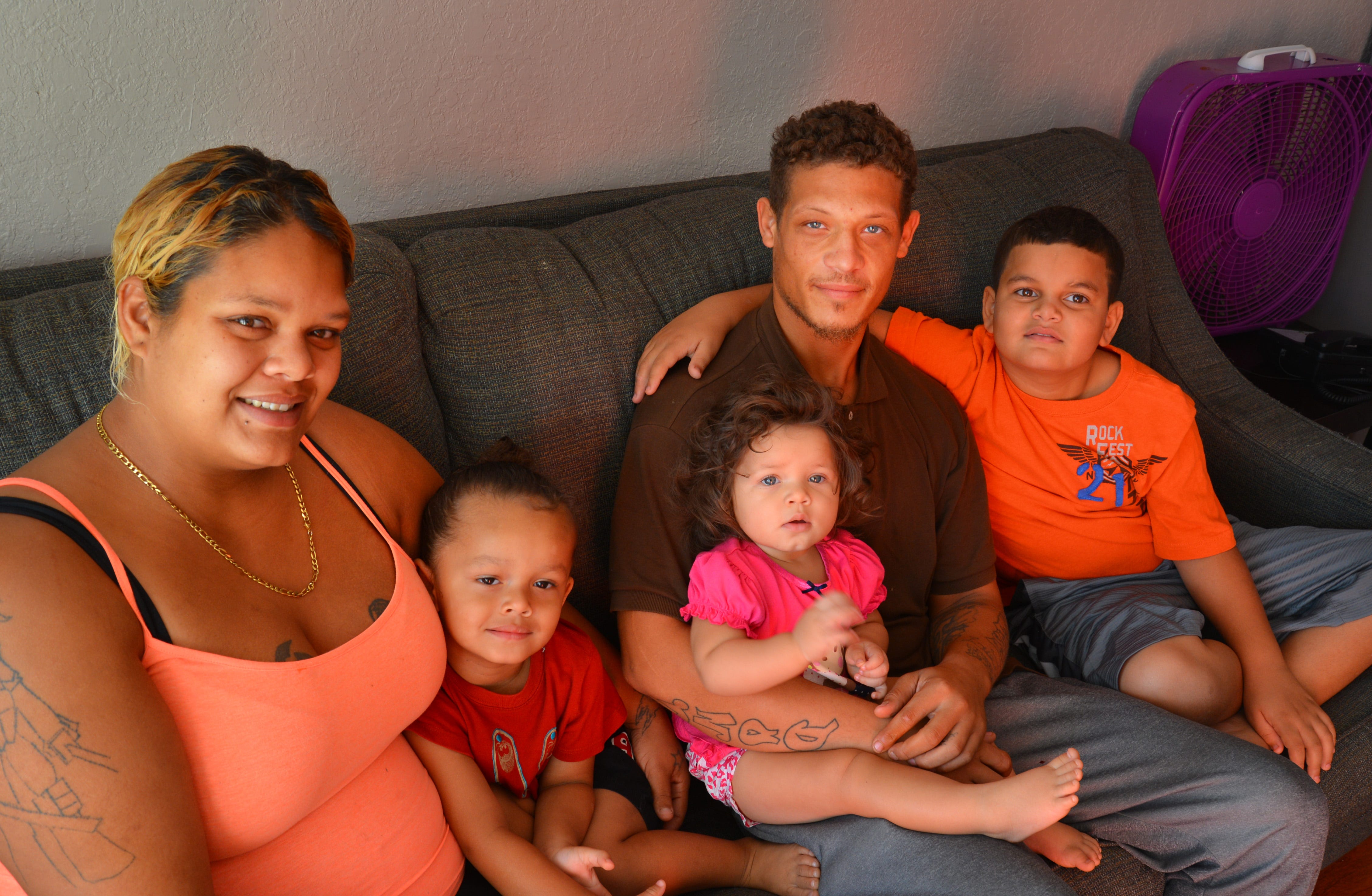 Rebecca Martinez and Brian Wall, with three of their children, are presently living in a hotel. Nicole Love,  a case manager for Community of Hope is trying to find them a place to live.