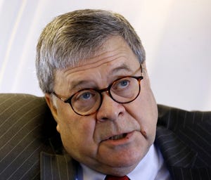 Attorney General William Barr speaks with an Associated Press reporter onboard an aircraft en route to Cleveland Thursday, during a two-day trip to Ohio and Montana.