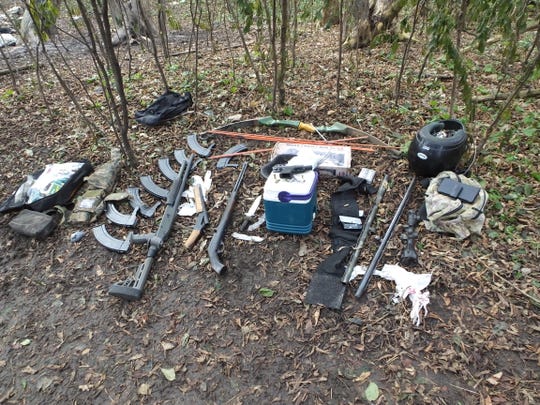Police found four guns, three knives and a hunting bow inside Geoffrey Graff's underground bunker near the Milwaukee River. Graff was arrested at Nov. 20 after firing a gun into the river.
