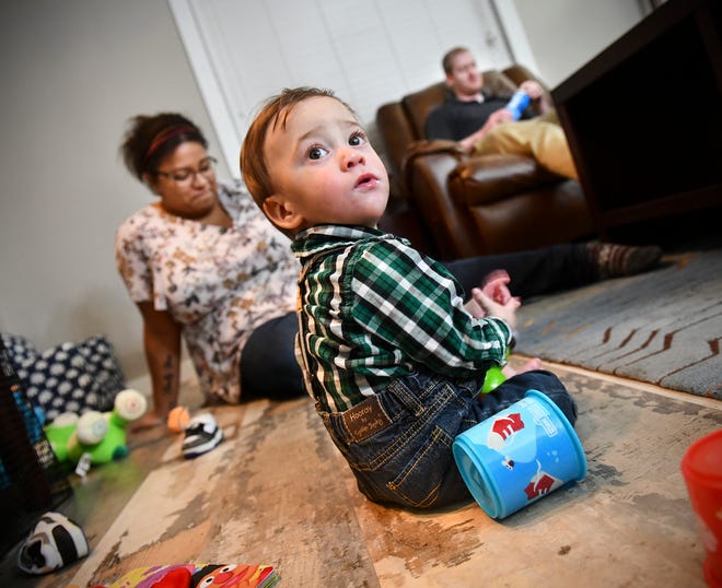Joshua Johnson plays on the floor near his parents Vicki and Christopher  Thursday, Nov. 21, 2019, at their home in Sauk Rapids. Joshua was born in Sept. 2018, more than three months early at 1 pound 14 ounces. 
