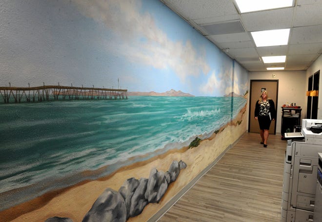 The Family Justice Center in Ventura greets visitors with a mural of the Ventura Pier.