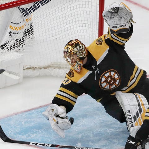 Boston Bruins goaltender Tuukka Rask makes a save 