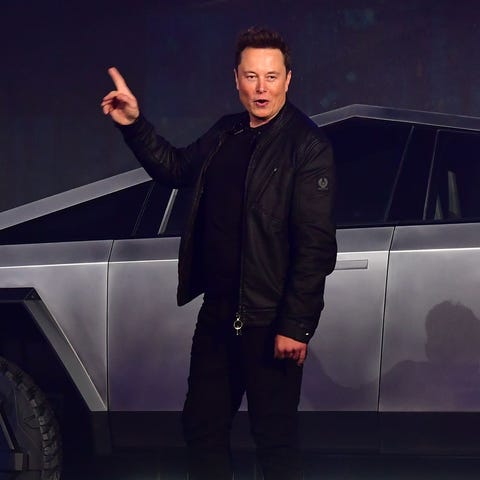 Tesla co-founder and CEO Elon Musk gestures while 