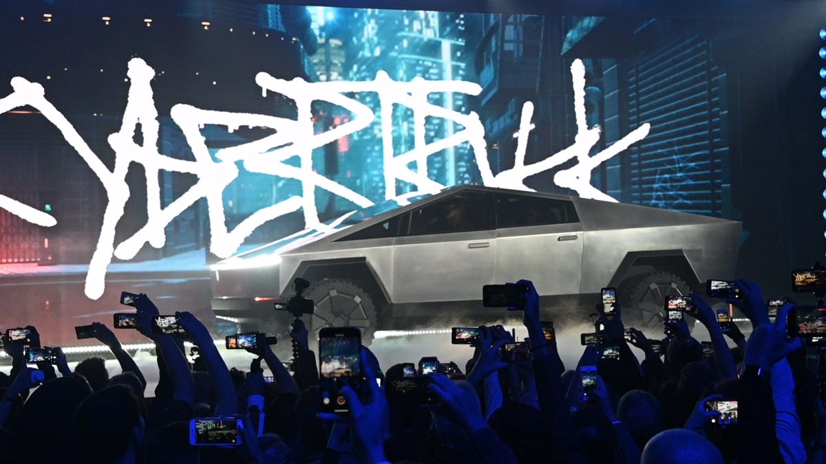 The Tesla Cybertruck takes the stage at an unveiling event Thursday night at the company's design studio in Hawthorne, Calif.