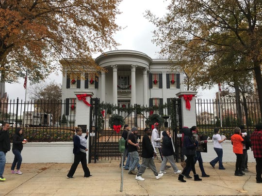 A group protesting mass incarceration in Mississippi marched around the governor's mansion in downtown Jackson on Saturday, Nov. 23, 2019.
