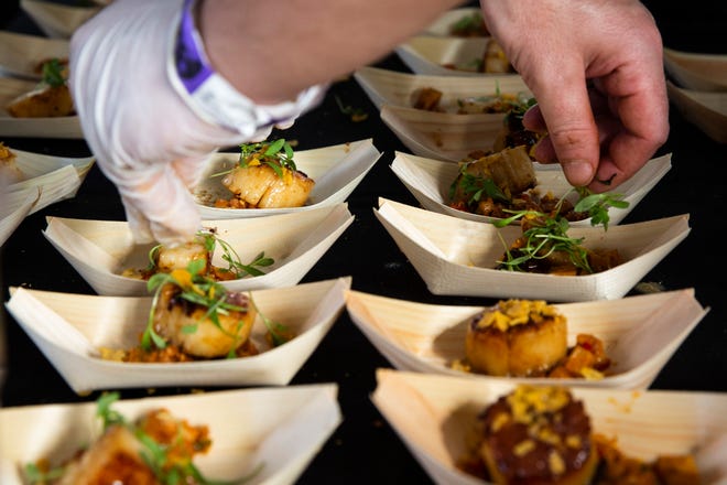 Locals and tourists enjoy food and wine during the 2019 Paradise Coast Food and Wine Experience on Saturday, Nov.  23, 2019 at Cambier Park in Naples.