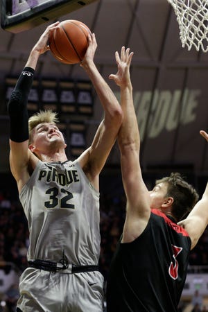 Purdue center Matt Haarms (32) goes up over Jacksonville State center Maros Zeliznak (3) for two during the second half of a NCAA men's basketball game, Saturday, Nov. 23, 2019 at Mackey Arena in West Lafayette.