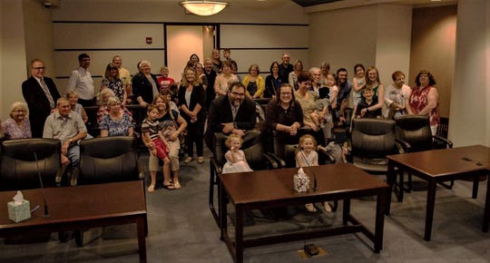 Family and friends of Adam and Jessica Sornchai filled a courtroom on May 30 at the Marion County Building to witness the final approval of the couple's adoption of Lailah and Alessandra.