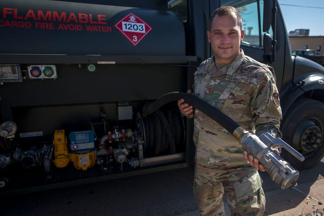 Tech. Sgt. Thomas Harris, 49th Logistics Readiness Squadron non-commissioned officer in charge of fuels distribution, holds a modified nozzle made for ground fuels, Nov. 14, 2019, on Holloman Air Force Base, N.M. The fuels distribution element recently purchased two R-13 Mobile Refueling Unit vehicles to ensure ground equipment and vehicles are getting the fuel they need.