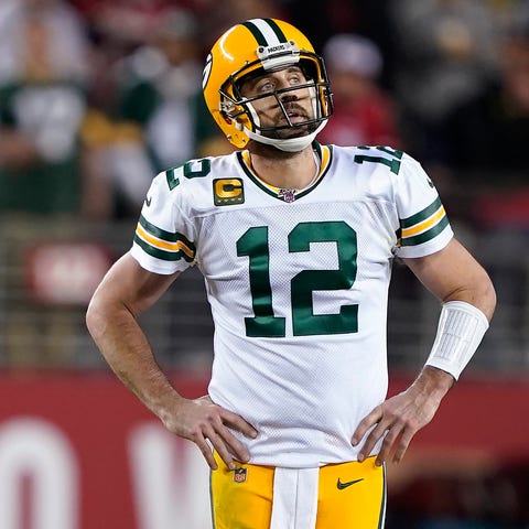 Green Bay Packers quarterback Aaron Rodgers reacts
