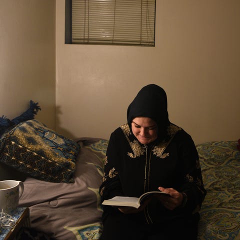 Khadijah Noor Tanju reads from "El Corán," a Spani