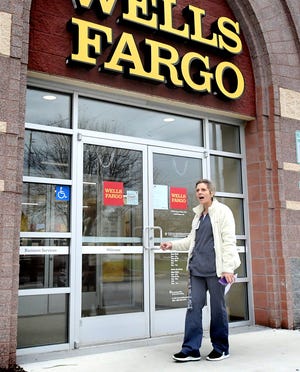 Heather Bahn of Felton finds that the Wells Fargo Bank in the 1400 block of Loucks Road was closed following an earlier robbery attempt at the branch Wednesday, Nov. 27, 2019. Bill Kalina photo