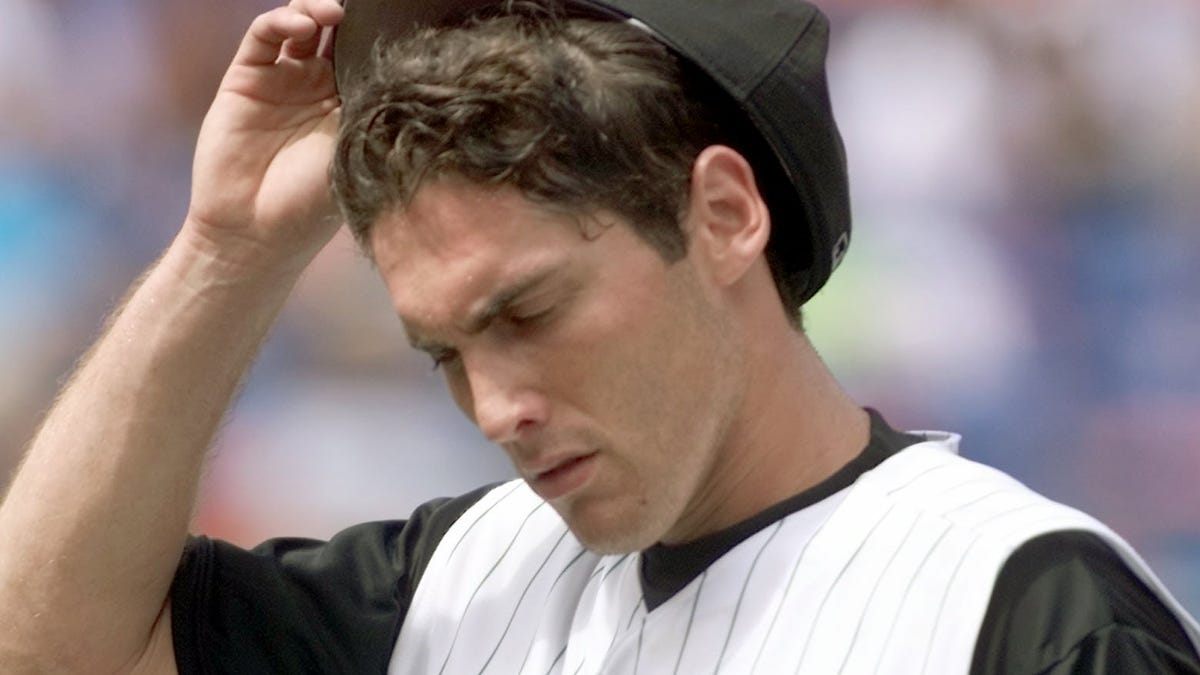 Justin Wayne walks off the mound in 2002.