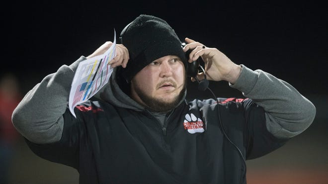 Cherry Hill East football coach Andrew Daley takes to the field prior to the football game between Cherry Hill West and Cherry Hill East, played at Cherry Hill West High School on Wednesday, November 27, 2019.  Cherry Hill West defeated Cherry Hill East, 19 -7.