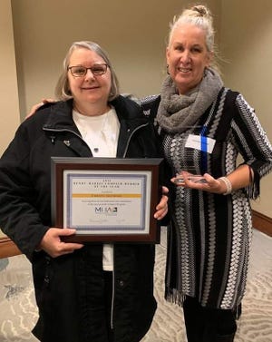 Christa Gutridge (left) received the Henry Mardis Compeer Program Award, and Rhonda Gibson (right) received the Paddy Kutz Award for Community, during Licking County Mental Health America's 66th annual meeting and dinner.