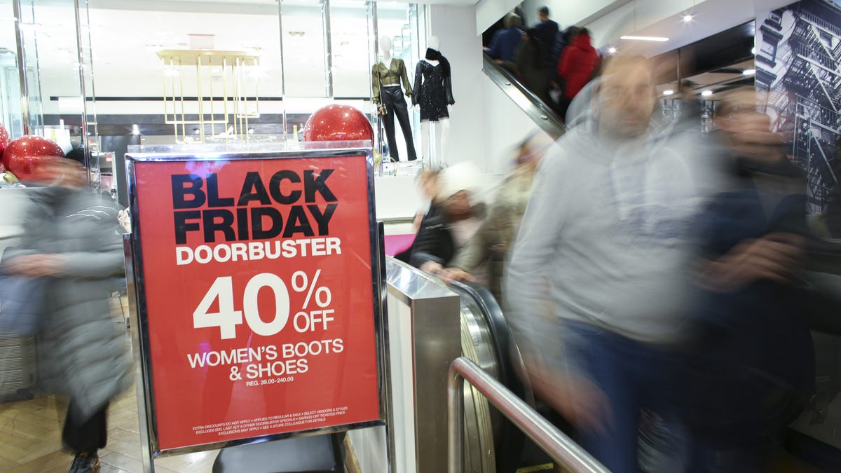 Shoppers arrive at Macy's store on as Black Friday sells starts early on Nov. 28, 2019, in New York.