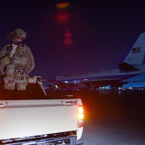 A US soldier stands guards next to Air Force One a