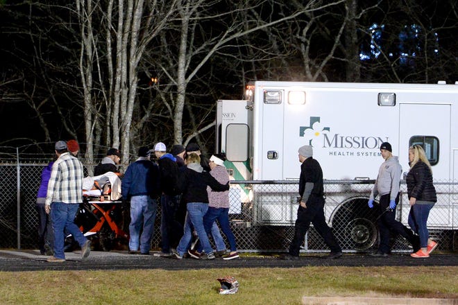 Swain County's Donnavin Groenewold is loaded into an ambulance at Mitchell High School after being hurt on the field during their NCHSAA third-round playoff game on Nov. 29, 2019. 