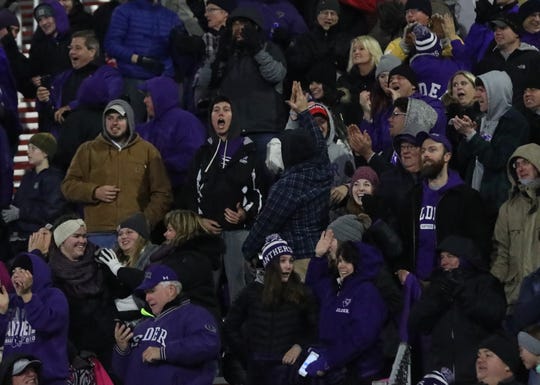 Elder fans celebrate during the Panthers' 31-24 win over Springfield, Friday, Nov. 29, 2019.