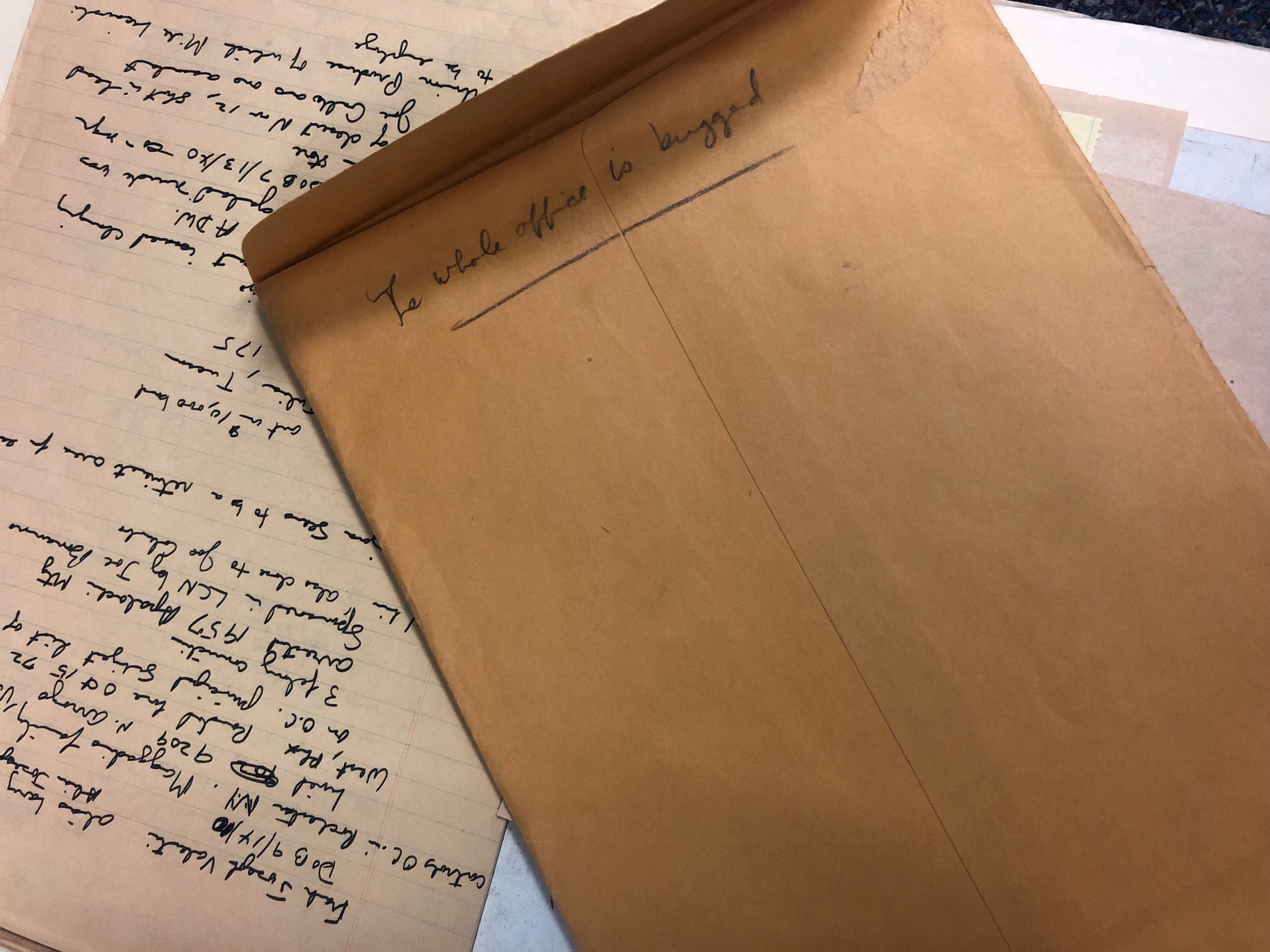 An envelope found in The Republic's Don Bolles files, with the message "the whole office is bugged" written in what appears to be Bolles' handwriting.