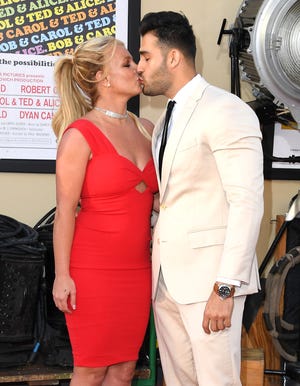 Britney Spears and Sam Asghari arrives at the Sony Pictures' "Once Upon A Time...In Hollywood" Los Angeles Premiere on July 22, 2019 in Hollywood, California.