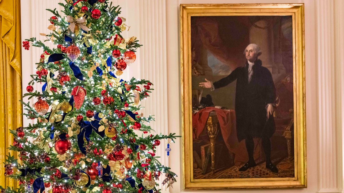 A portrait of George Washington is seen beside a Christmas tree at the 2019 holiday dŽcor preview at the White House. The office of First Lady Melania Trump hosted a preview of the White House's 2019 Christmas decorations on Dec. 2, 2019. 