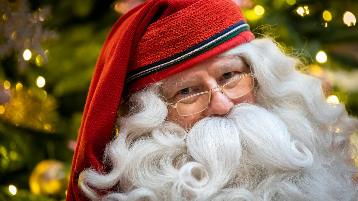 Joulupukki, the Santa Claus from Lappland of Finland, looks on during his press conference in a hotel in Budapest, Hungary, on Nov. 28, 2019. 