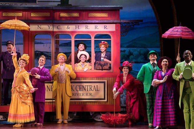 Carolee Carmello, as Dolly Levi, is seen with the ensemble from the National Tour of “Hello, Dolly!”