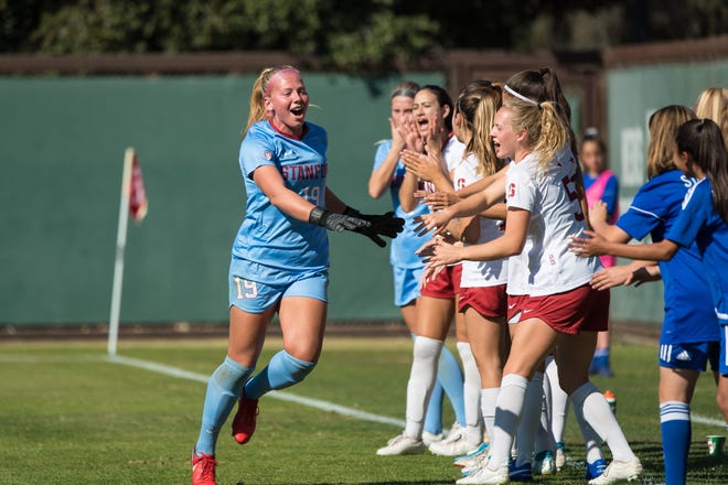 Freshman goalie Katie Meyer, left, a Newbury Park High graduate, has helped the No. 1 Stanford University women's soccer team reach the NCAA Division I College Cup this weekend in San Jose.