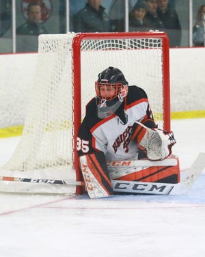 Brighton's Chris Wozniak made 12 saves for his first shutout in a 4-0 victory over Livonia Churchill.
