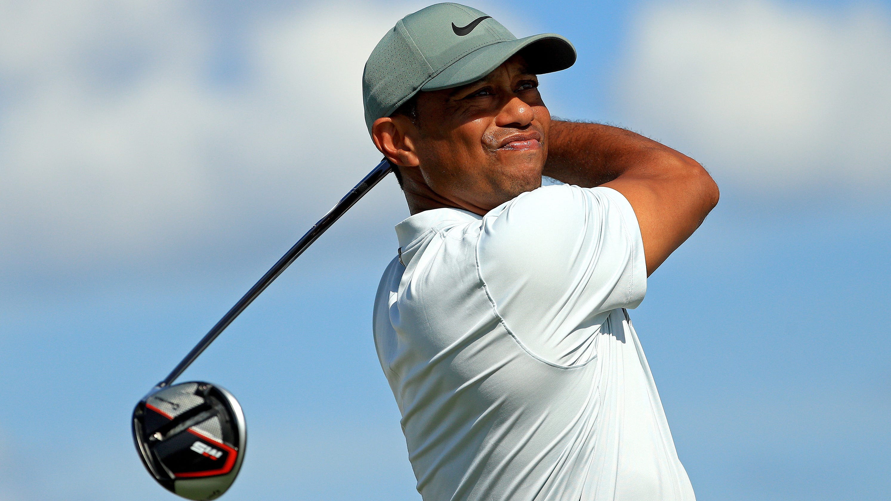 Tiger Woods gets back into Hero World Challenge with second-round 66
