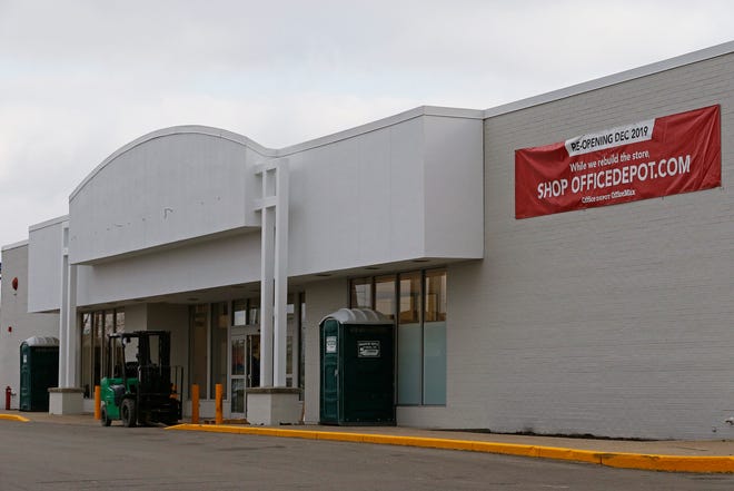 Work continues on Friday, Dec. 6, 2019, to get the OfficeMax store at the Richmond Mall ready to reopen.