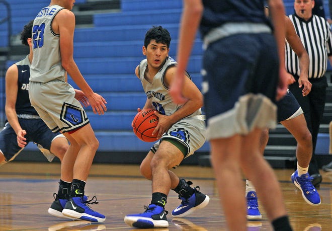 Erick Torres, center, controls the ball for Lake View during the Doug McCutchen Memorial Tournament on Friday, Dec. 6, 2019.
