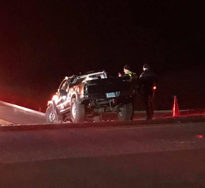 Authorities inspect a truck that was involved in a deadly crash Thursday night on Interstate 81 in Staunton.