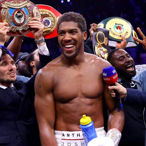 Anthony Joshua celebrates his victory over Andy Ru