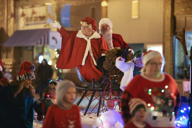 Santa and Mrs. Claus make their appearance at the 2019 Fond du Lac Christmas parade in this Dec. 7, 2019, file photo. The parade returns Saturday to downtown Fond du Lac. There are plenty of festive events to partake in around the Fond du Lac area this holiday season.