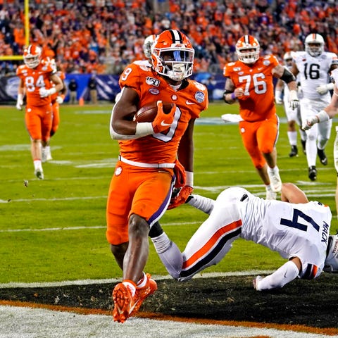 Clemson running back Travis Etienne scores a touch