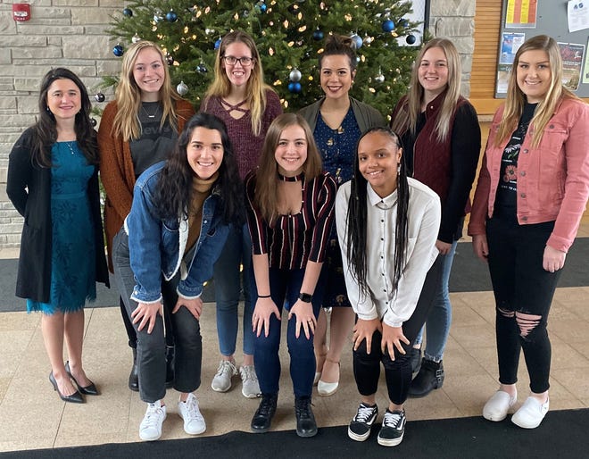 Marian University's Sabre Voice will publish only its second print edition since 2007 on Dec. 10. Pictured are, back row, from left: Assistant Professor of Communication Patricia Hernandez, Emma Lewandowski, Laney  Spradlin, Bradey Resulta and Jazmyne Thomson; front row: Gracie Thies, Robynn Leverich
and Shana Risby.