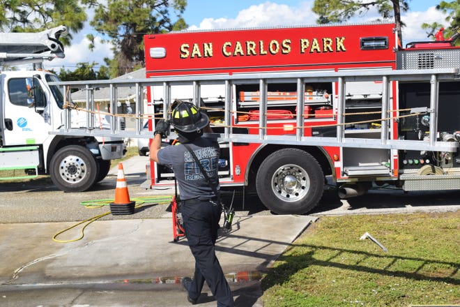 Firefighters from San Carlos Park Fire District put out a fire at a home on Love Road on Monday afternoon.