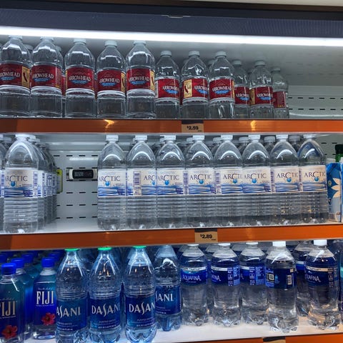 Bottled water is pricey at the airport. Save money