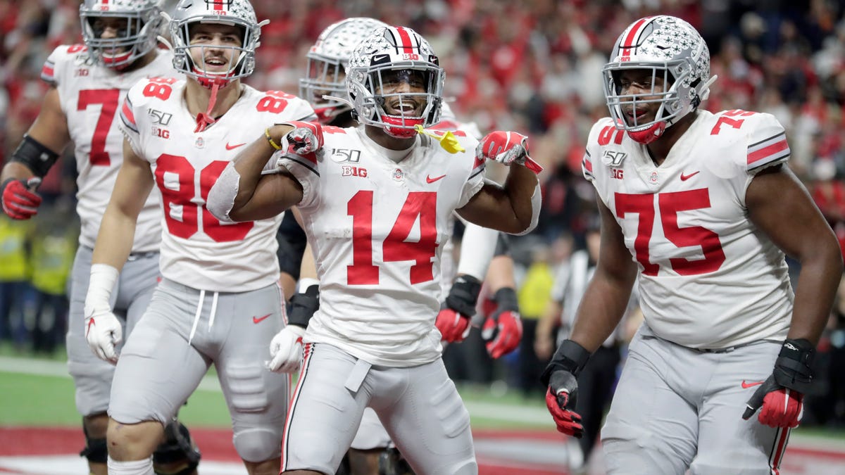 Ohio State wide receiver K.J. Hill (14) celebrates a touchdown during the second half of the Big Ten championship against Wisconsin.