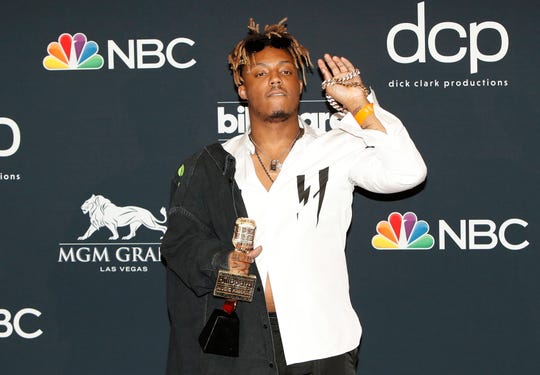 Juice WRLD poses with the Top New Artist Award at the 2019 Billboard Music Awards in Las Vegas, May 1, 2019