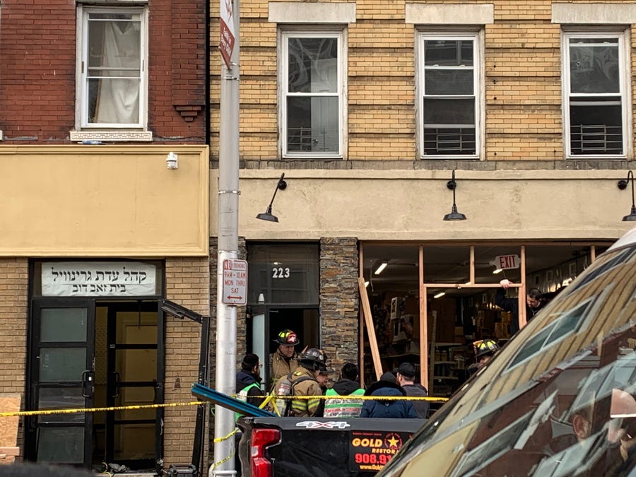 Firefighters respond to the scene of a shooting in Jersey City Dec. 11, 2019.