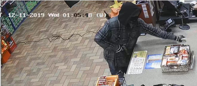 Security footage from a robbery at a business in the 5300 block of West 57th Street.