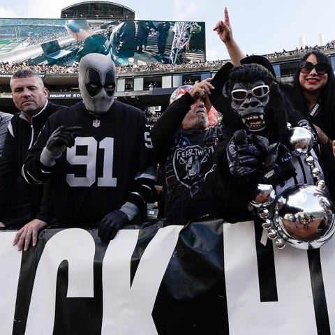 Raiders fans cheer in the game against  Tennessee 