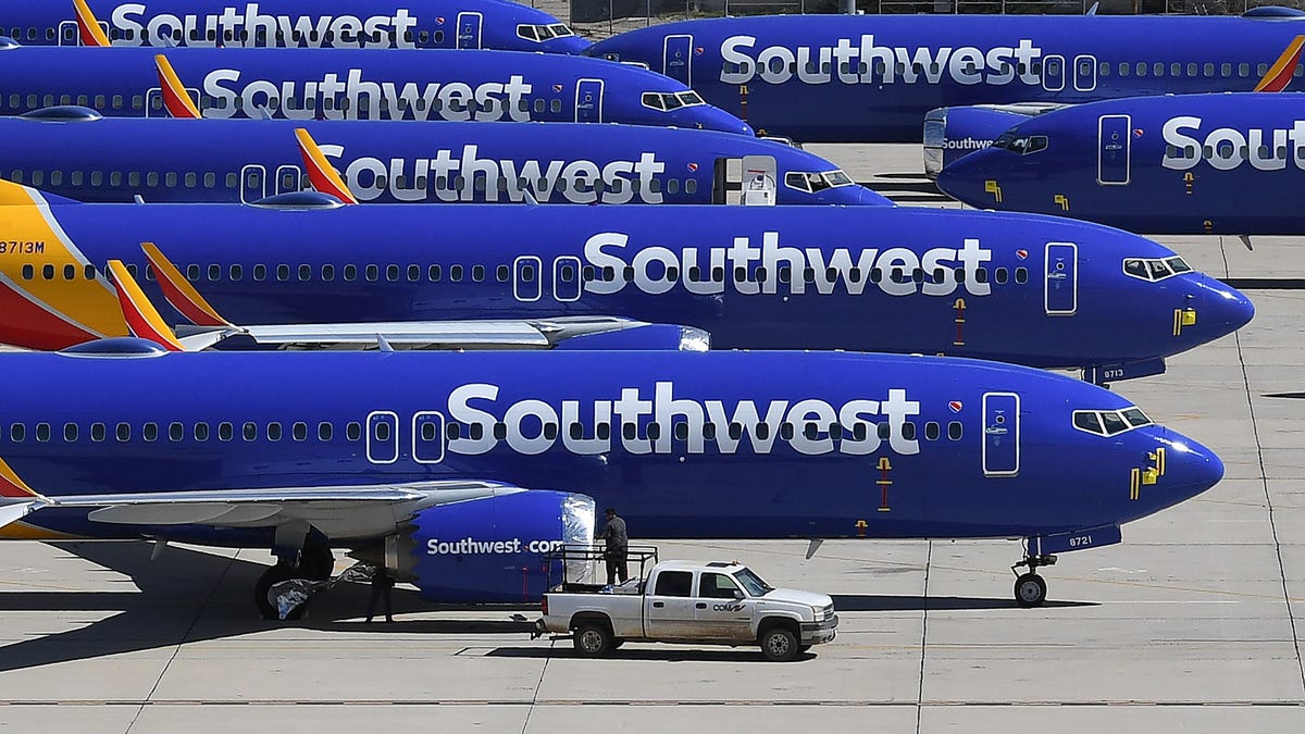 Southwest Airlines Boeing 737 MAX aircraft are parked on the tarmac at the Southern California Logistics Airport in Victorville, California, after being grounded.