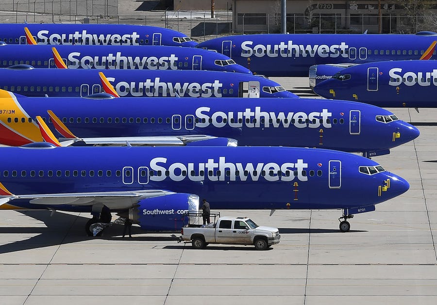 Southwest Airlines Boeing 737 MAX aircraft are parked on the tarmac after being grounded, at the Southern California Logistics Airport in Victorville, California.