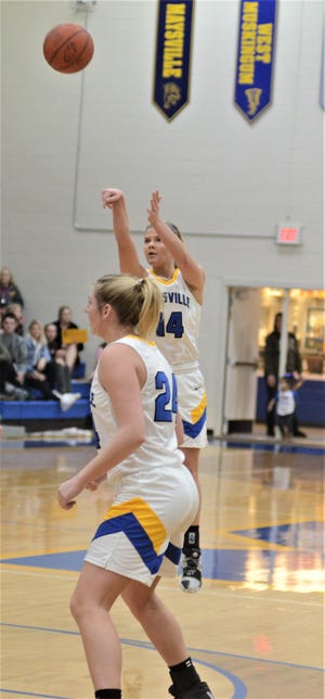 Maysville's Bailee Smith launches a 3, which she made to surpass 1,000 career points in Wednesday's game against John Glenn. The Panthers won 59-27.