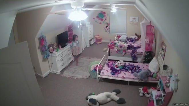 A screenshot of footage from the Ring camera owned by the family of Ashley LeMay, who says someone hacked into the device and chatted with her daughter.